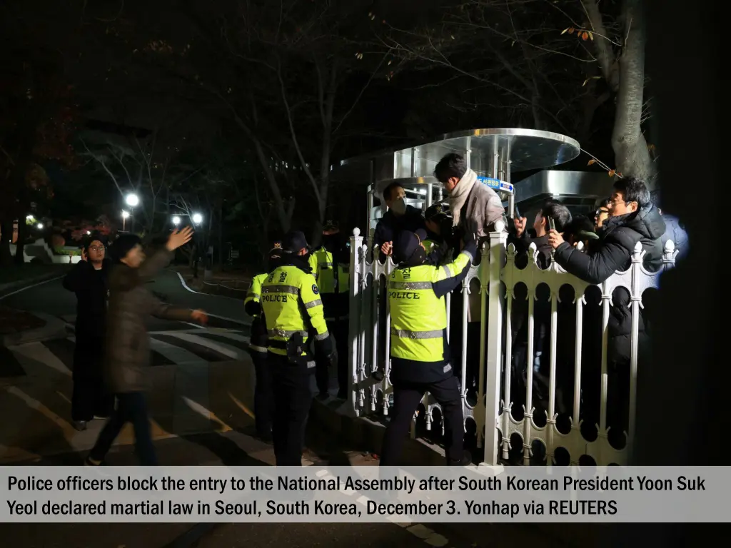 police officers block the entry to the national