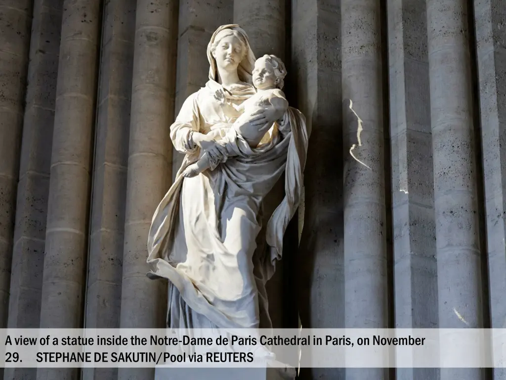 a view of a statue inside the notre dame de paris