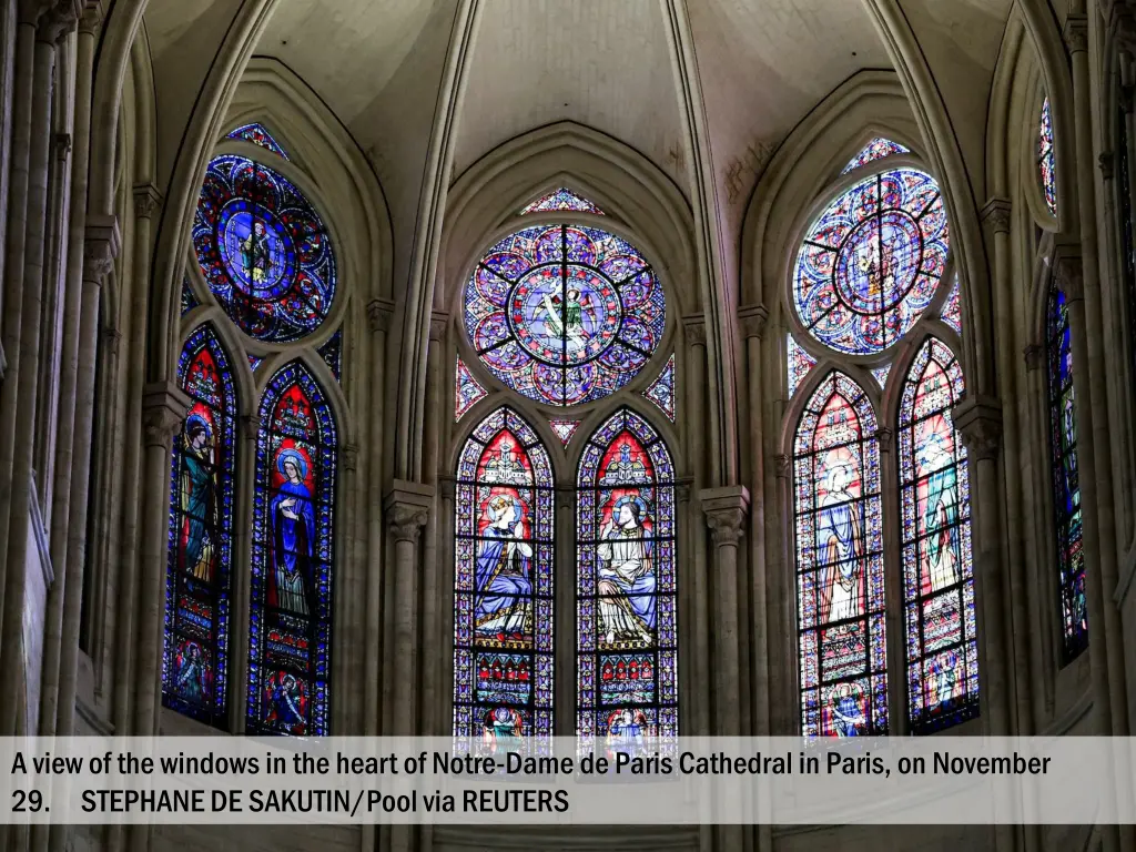 a view of the windows in the heart of notre dame