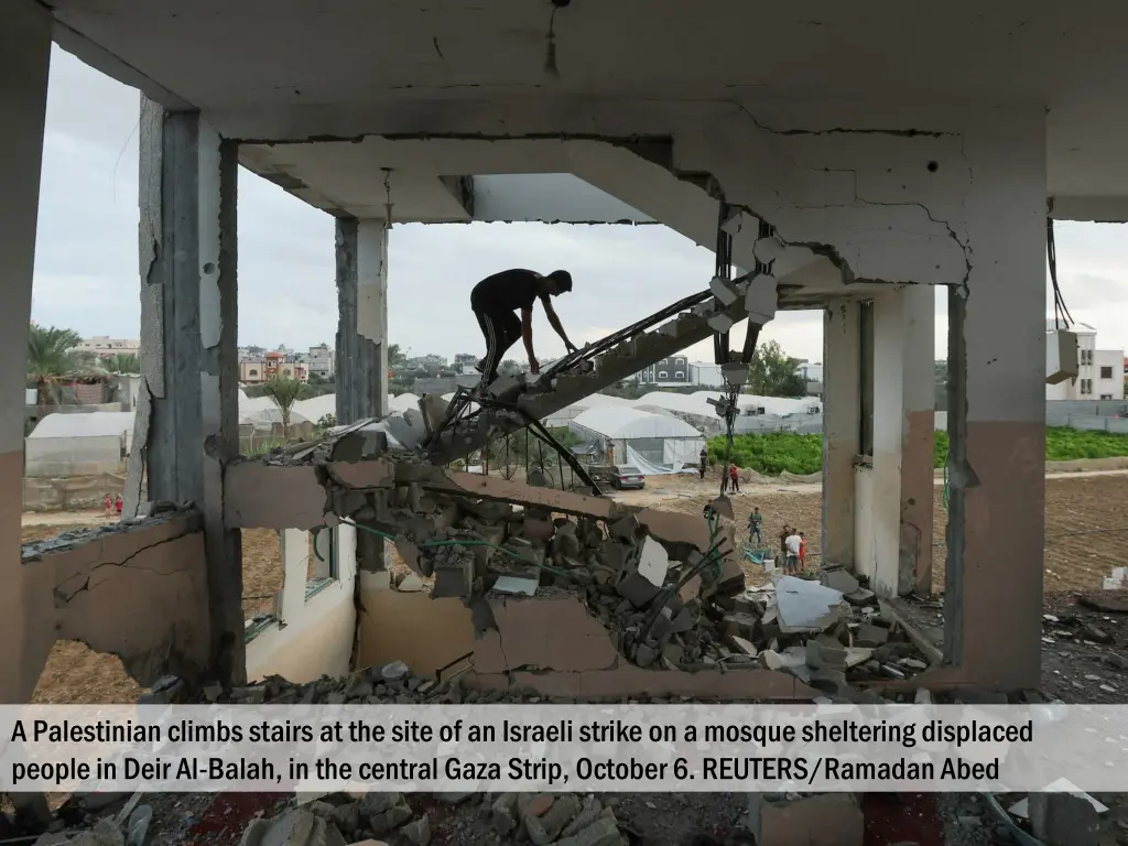 a palestinian climbs stairs at the site