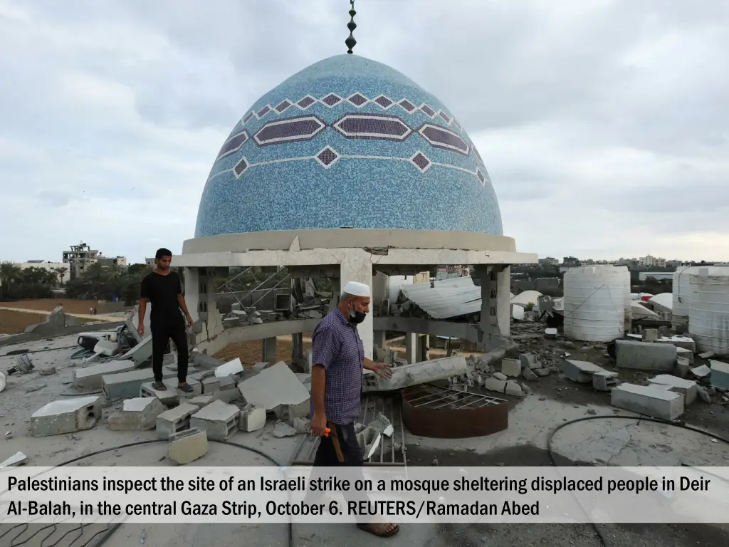 palestinians inspect the site of an israeli 1