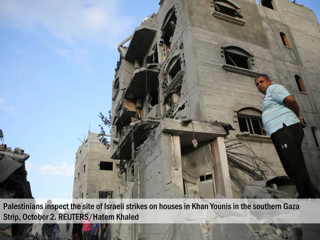 palestinians inspect the site of israeli strikes 2