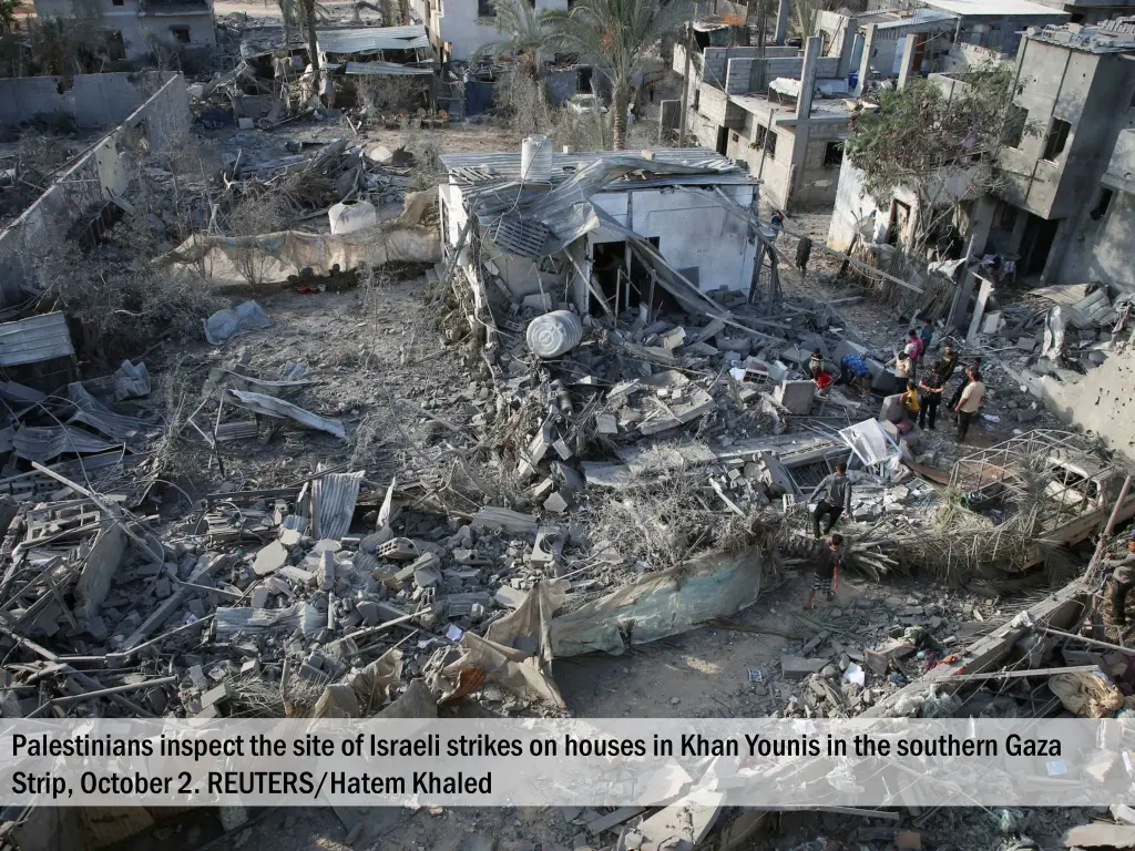 palestinians inspect the site of israeli strikes 3