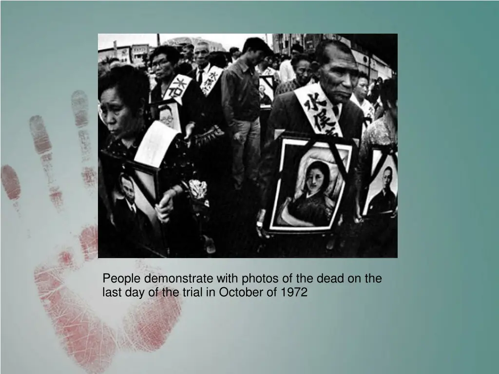 people demonstrate with photos of the dead