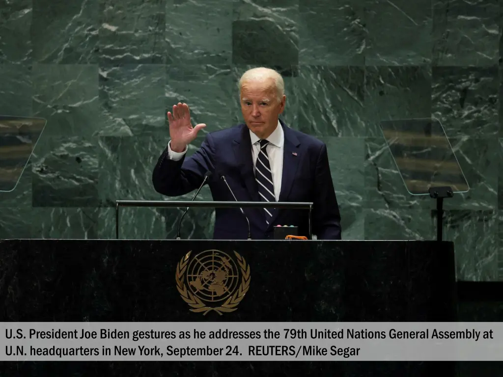 u s president joe biden gestures as he addresses