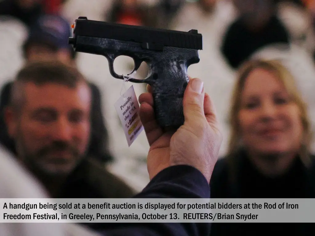 a handgun being sold at a benefit auction