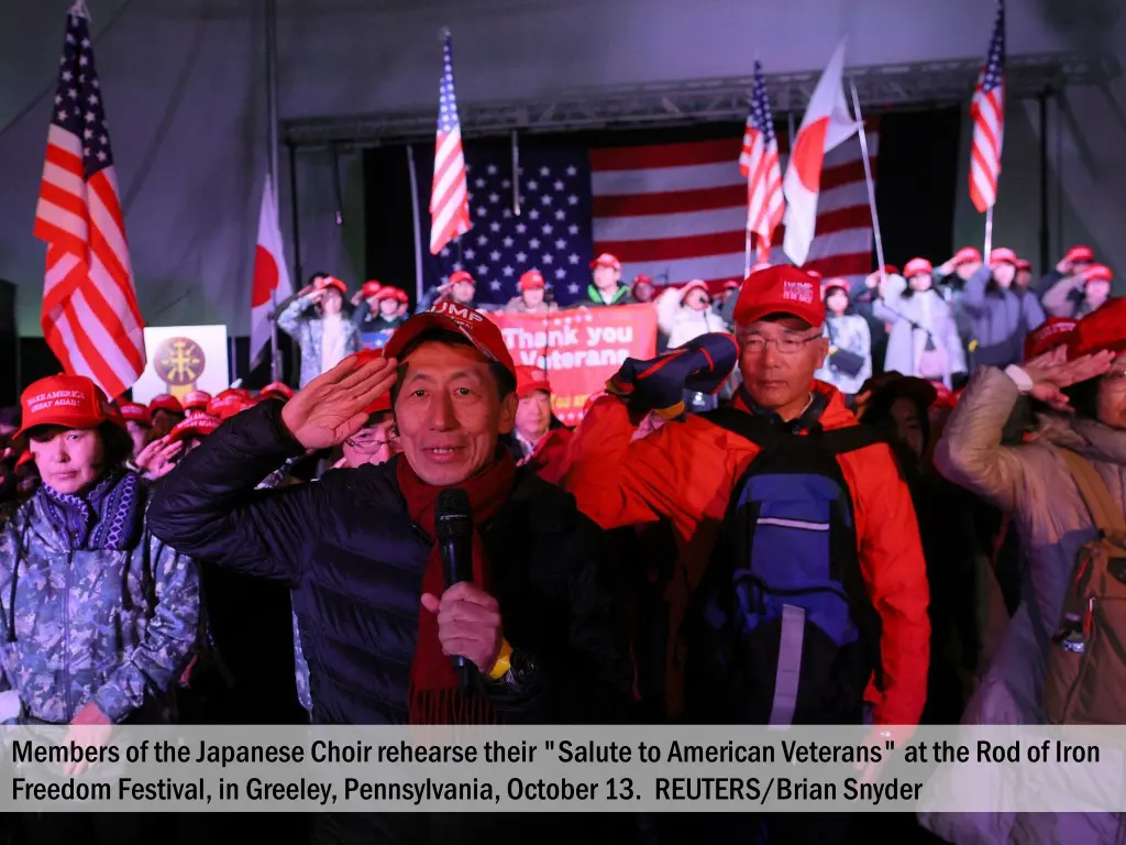 members of the japanese choir rehearse their