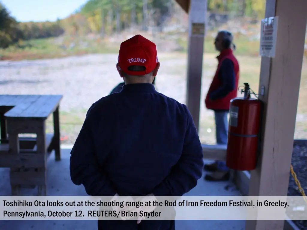 toshihiko ota looks out at the shooting range