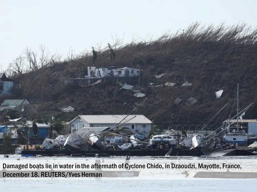 damaged boats lie in water in the aftermath 1