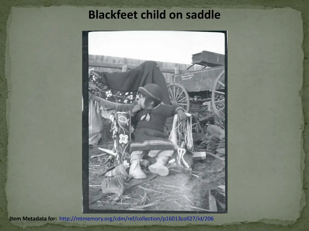 blackfeet child on saddle