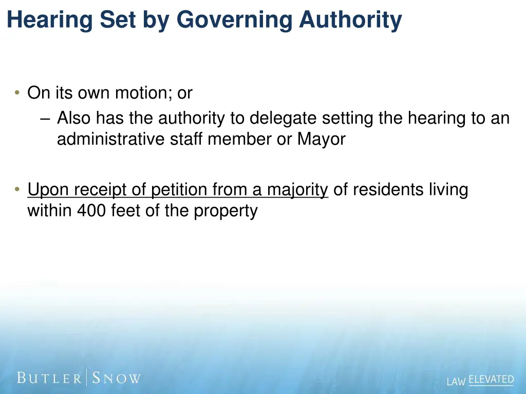 hearing set by governing authority