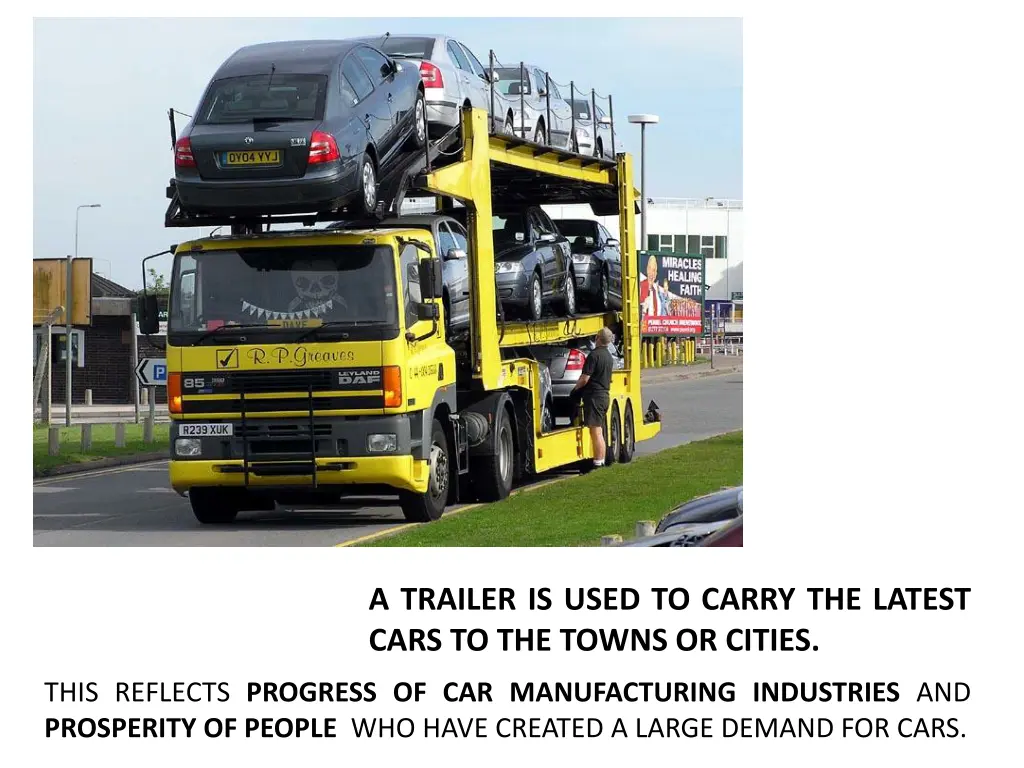 a trailer is used to carry the latest cars