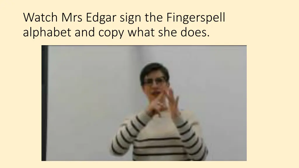 watch mrs edgar sign the fingerspell alphabet