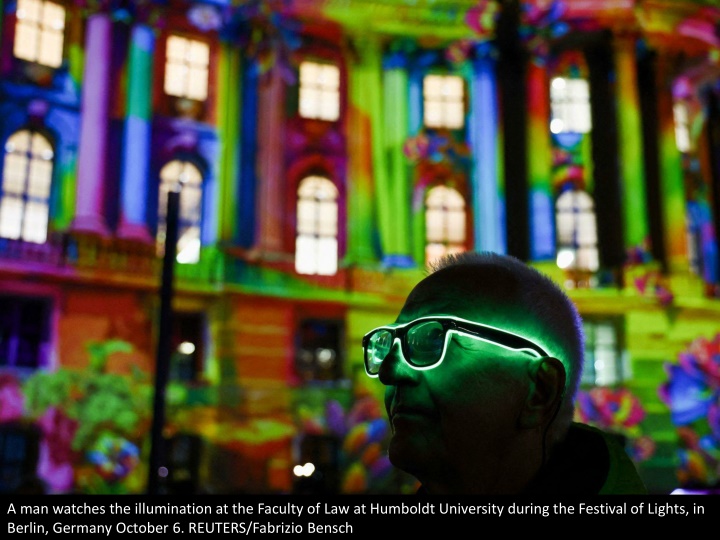 a man watches the illumination at the faculty