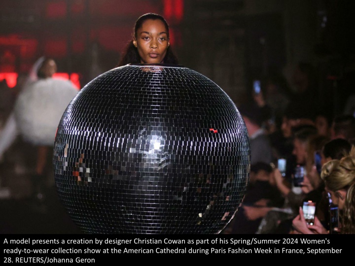 a model presents a creation by designer christian