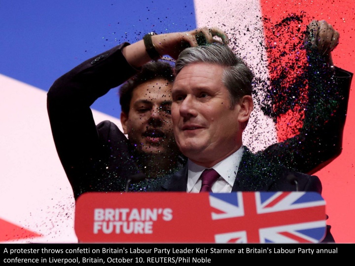 a protester throws confetti on britain s labour