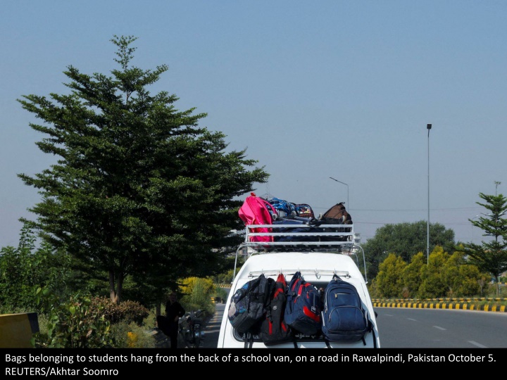 bags belonging to students hang from the back