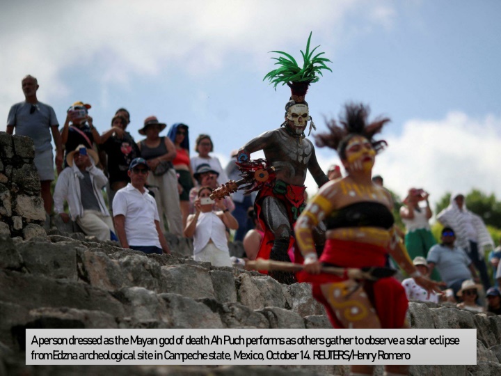 a person dressed as the mayan god of death