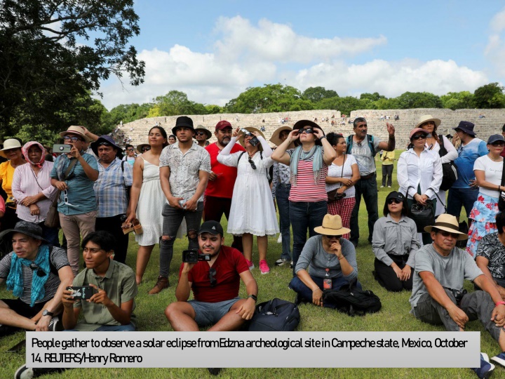 people gather to observe a solar eclipse from