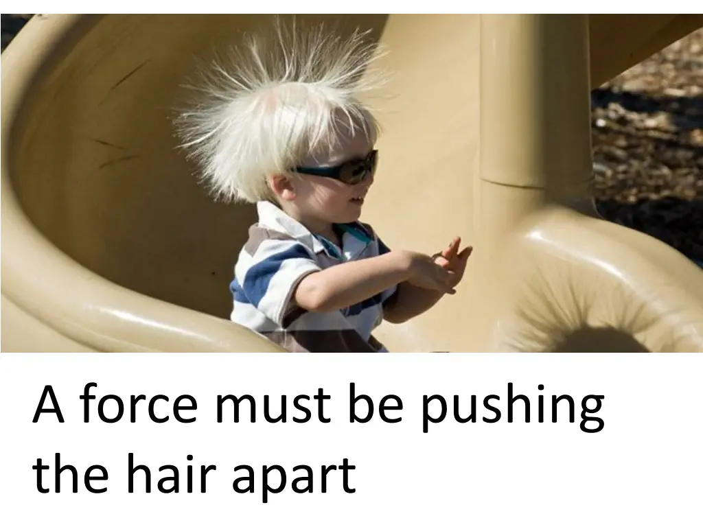 a force must be pushing the hair apart