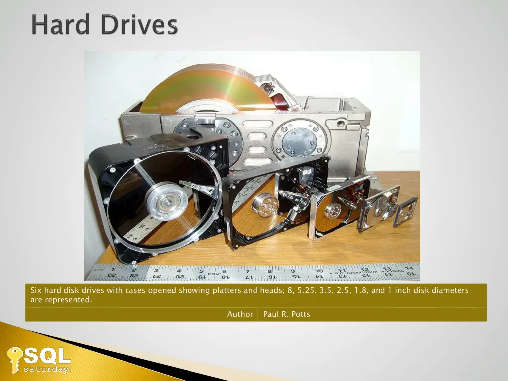 six hard disk drives with cases opened showing