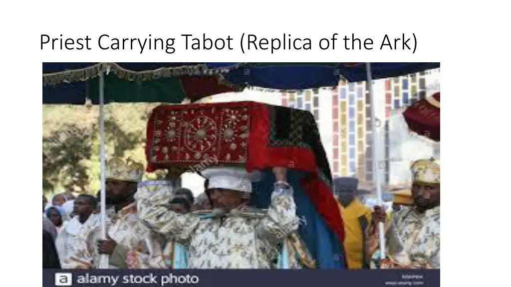 priest carrying tabot replica of the ark