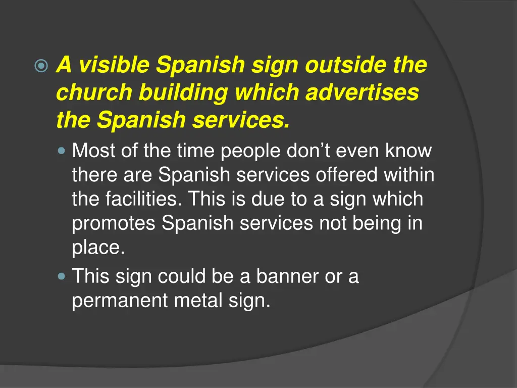 a visible spanish sign outside the church