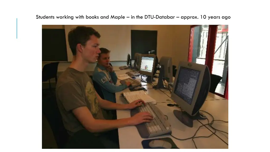 students working with books and maple
