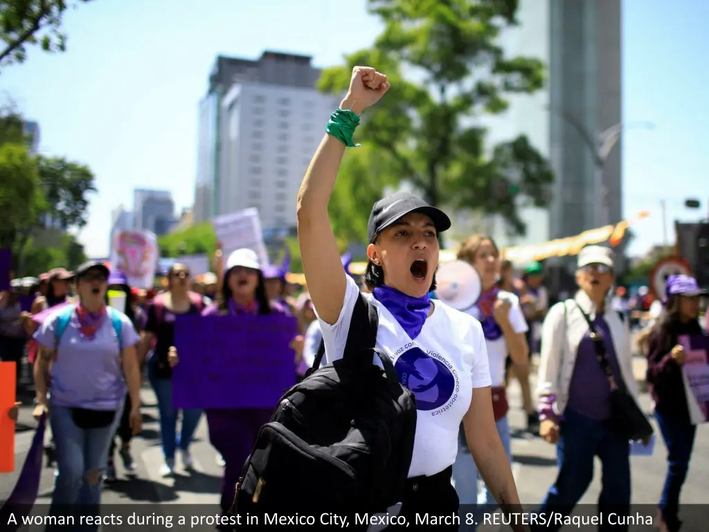 a woman reacts during a protest in mexico city