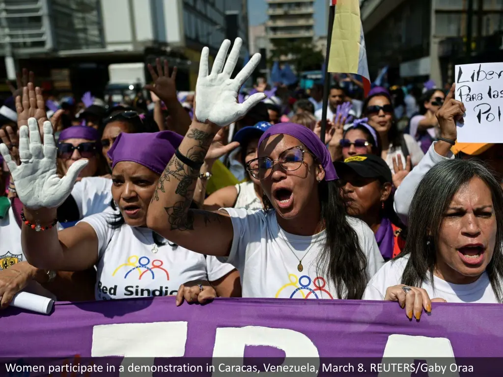 women participate in a demonstration in caracas