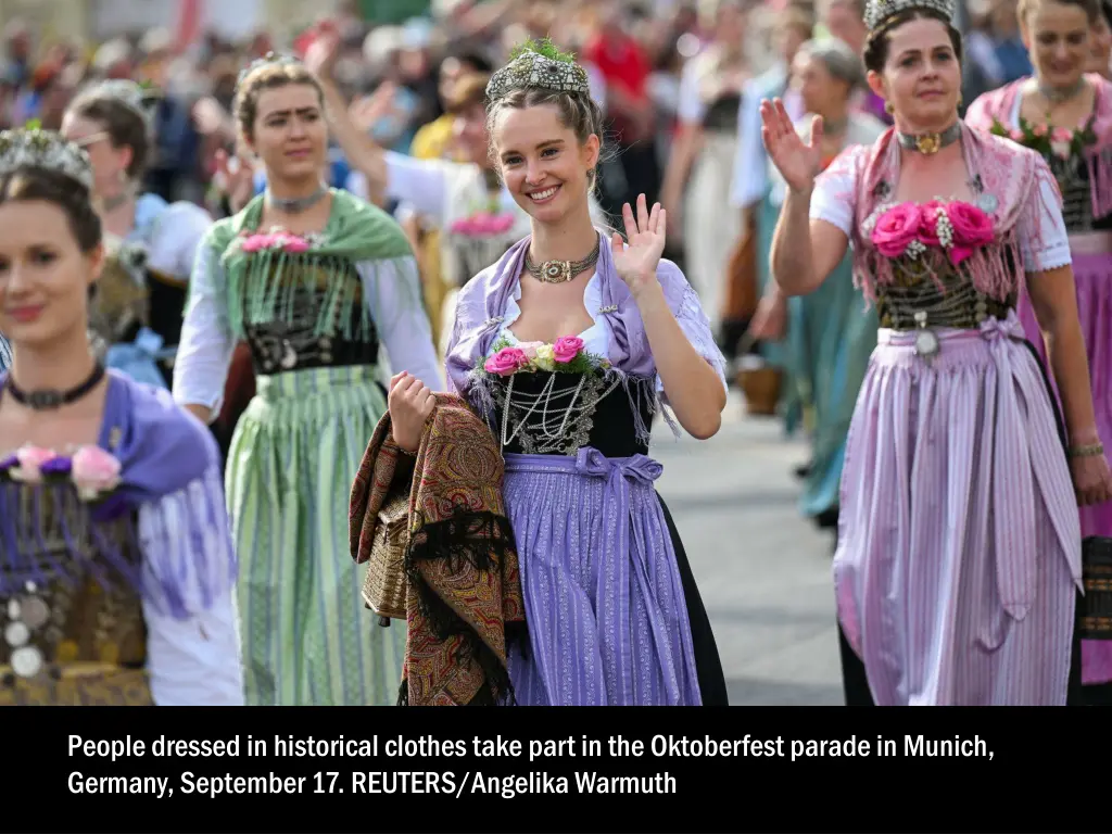 people dressed in historical clothes take part 1