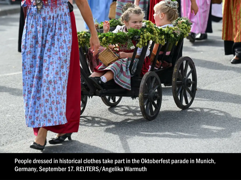 people dressed in historical clothes take part 2