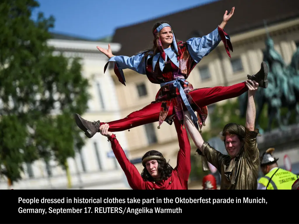 people dressed in historical clothes take part 5