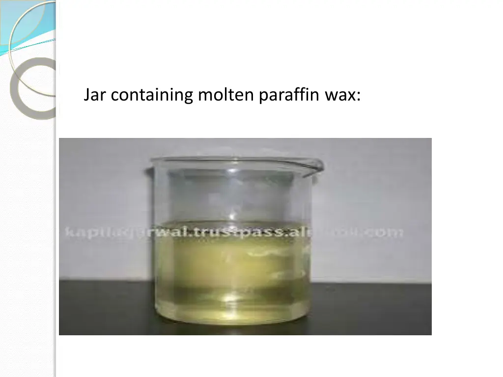jar containing molten paraffin wax
