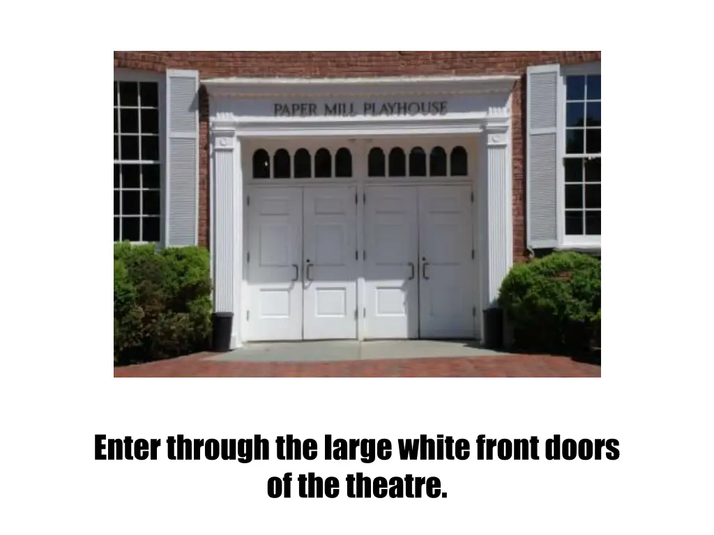 enter through the large white front doors