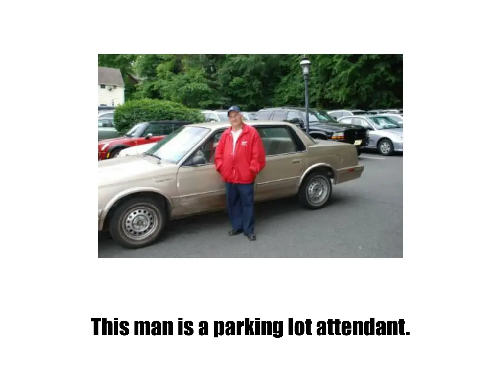 this man is a parking lot attendant