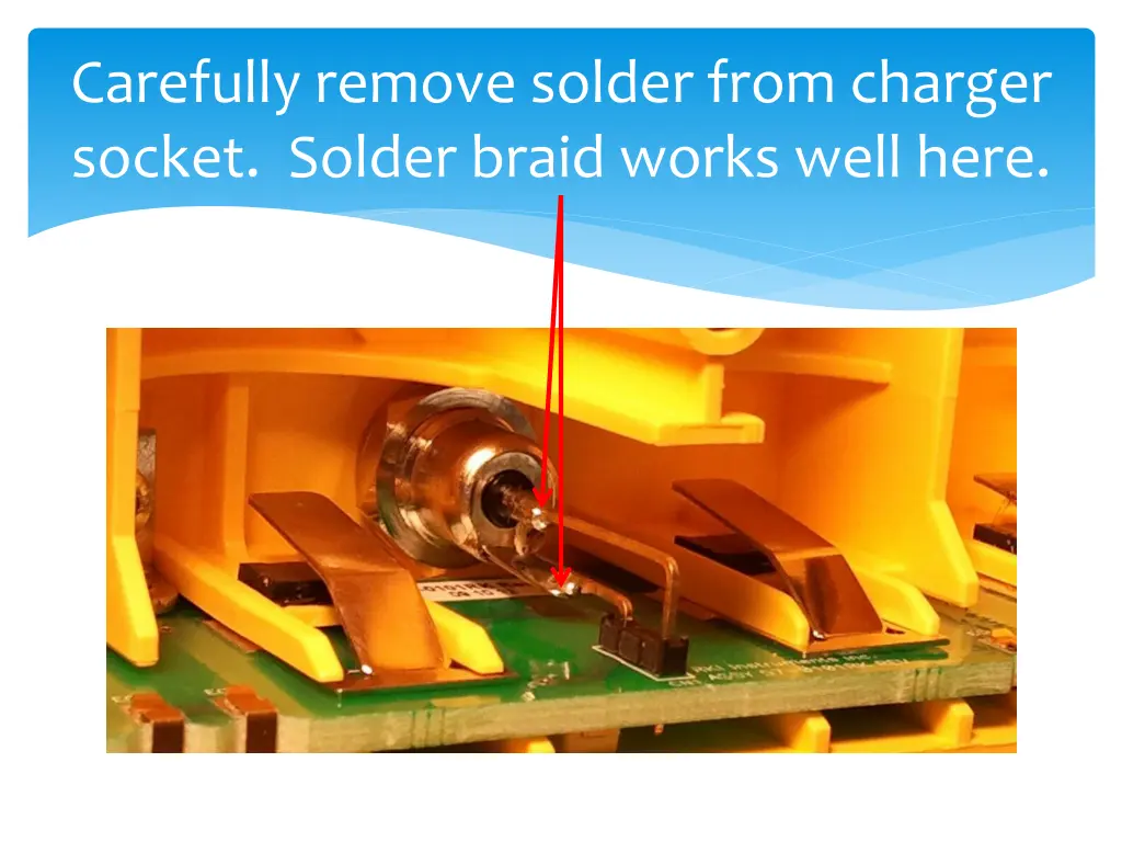 carefully remove solder from charger socket