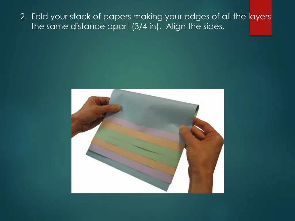 2 fold your stack of papers making your edges
