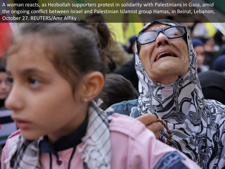 a woman reacts as hezbollah supporters protest