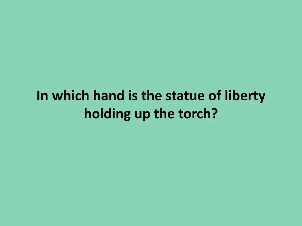in which hand is the statue of liberty holding